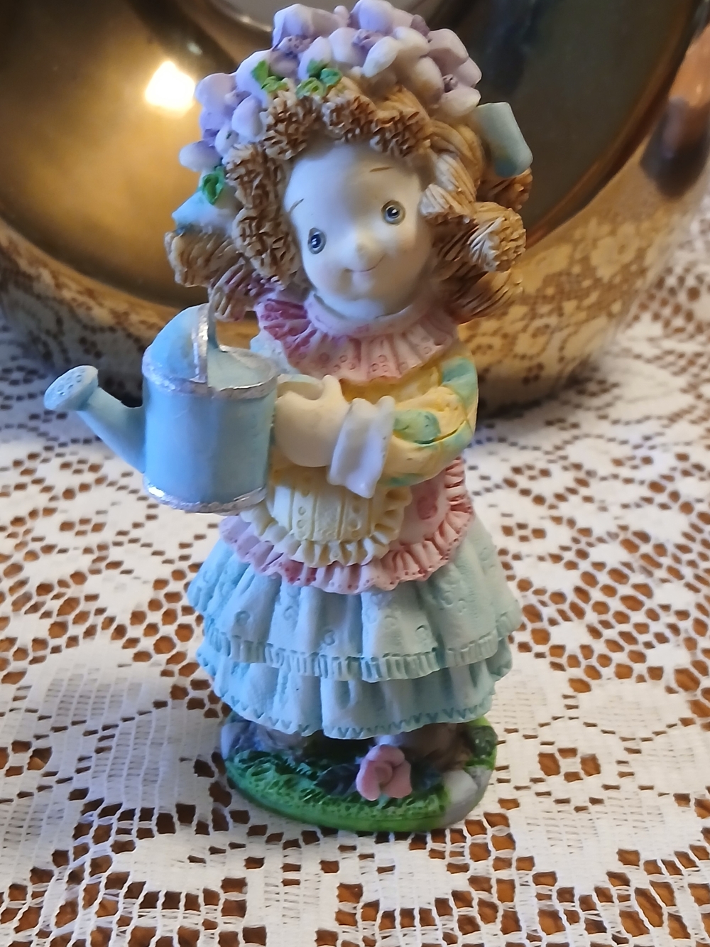 Resin Figurine Of A Girl  with Blue A Watering Can